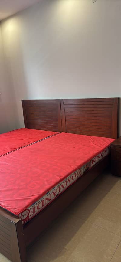 2 Single wood beds