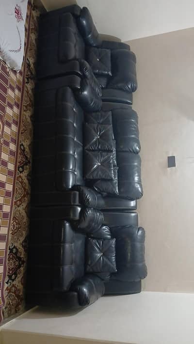 7 seater leather sofa . . . . selling because of shifting