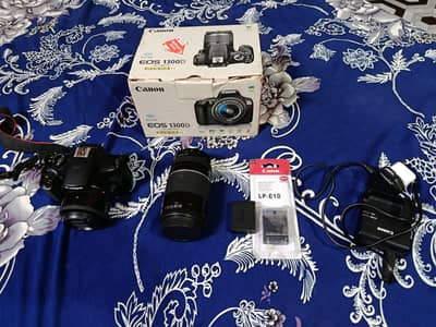 Canon 1300D with Box 75-300mm and 50mm lense 2 batteries