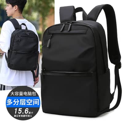 blacke multi space backbag and laptop storage