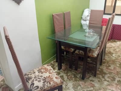 6 seater glass dining table