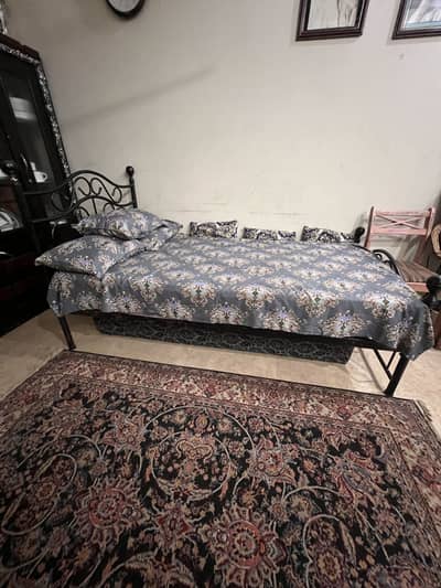 Selling two single beds without mattress