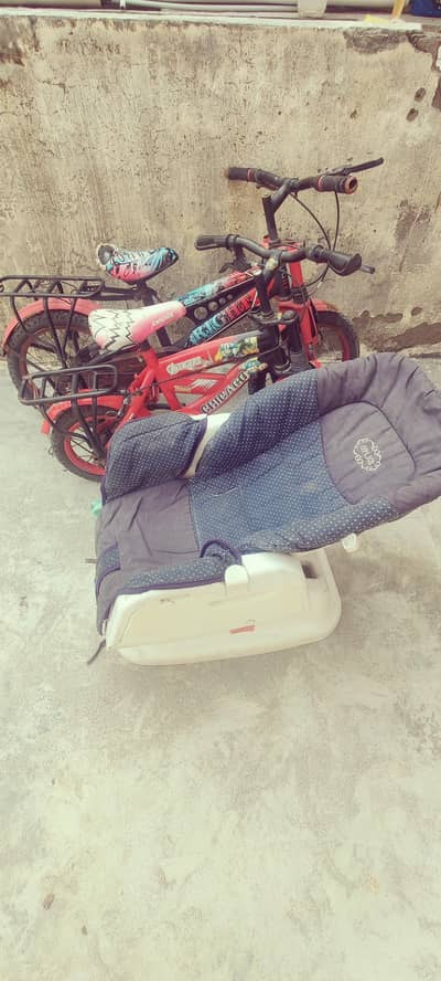kids bicycle and baby cort