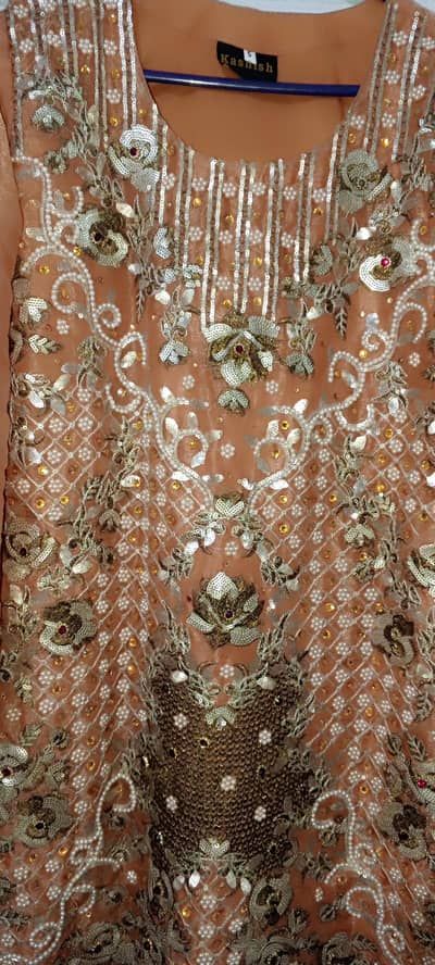 full heavy embroidery suit buhat acha hai