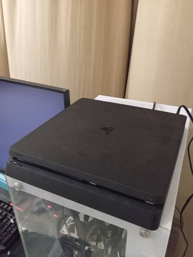 PS4 Slim with 2 games