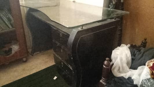 Office table with glass top. . .