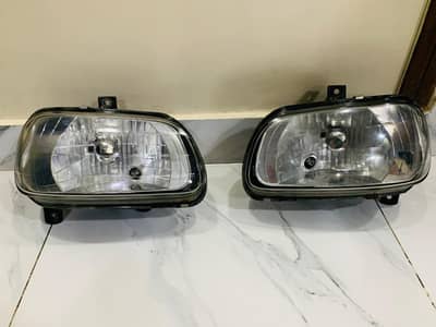 DAIHATSU COURE HEAD LIGHTS