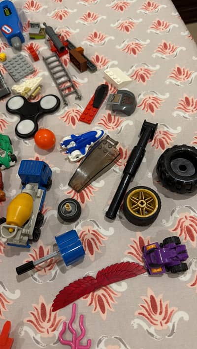 Toy mix for sale (action figures, Lego pieces, bowling game, toy gun)