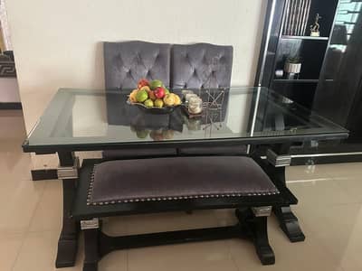 glass and wooden dining table