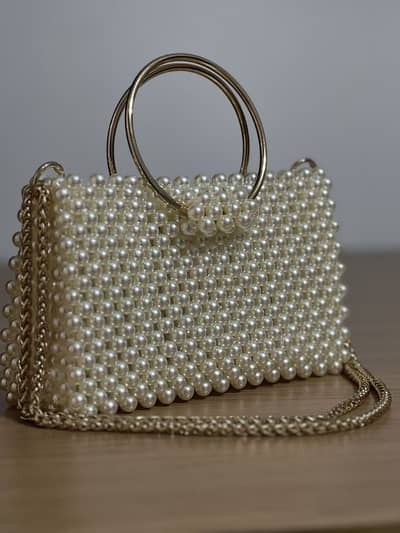 Handmade pearl beads crystal bags available