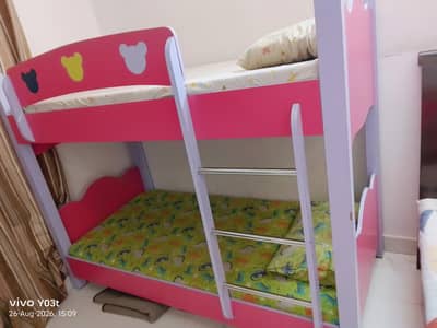 wooden bed, without mattress