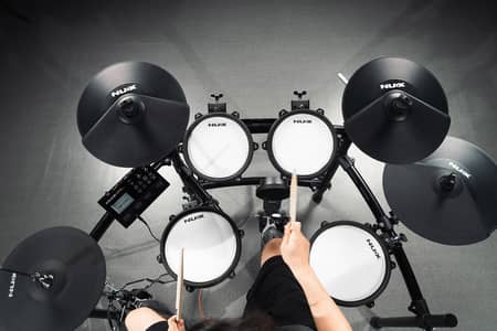 The NUX DM-310H is a professional-grade all-mesh electronic drum kit