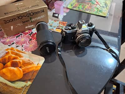 NIKON Camera with a TELEPHOTO 70-210 mm Lens