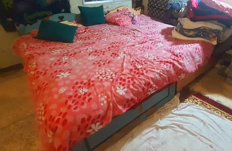 Bed with side tables