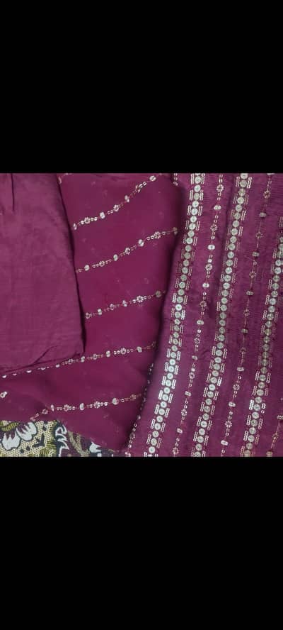 Raw silk beautiful maroom colour 3 piece unstitched suit with elegant
