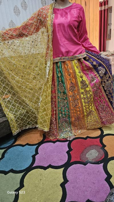 Beautiful multicoloured lengha choli for Mehndi Mayun