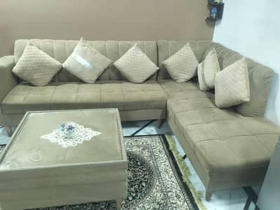 l shape sofa with center table 2 puffy and 1 sitey