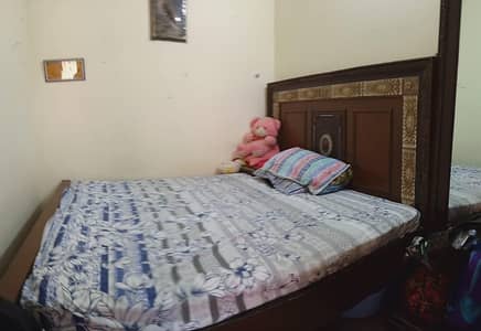 Slightly used king size bed with mattress