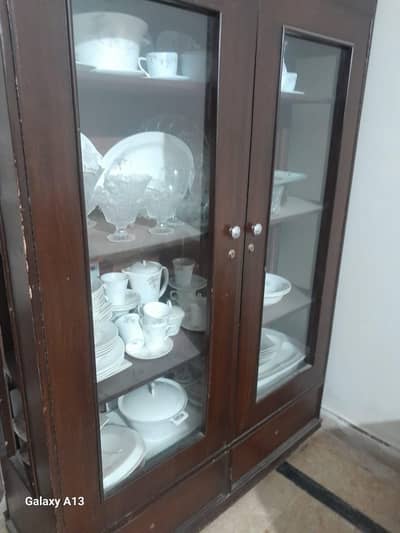 wooden showcase and wooden cupboard