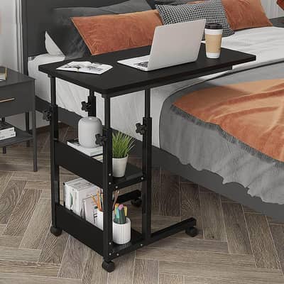 Black laptop  tables with two wheels & shelf