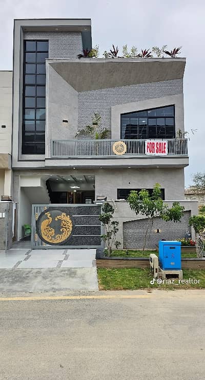 5 Marla Double Unit designer House Available. For Sale in Faisal Town F-18 Islamabad.