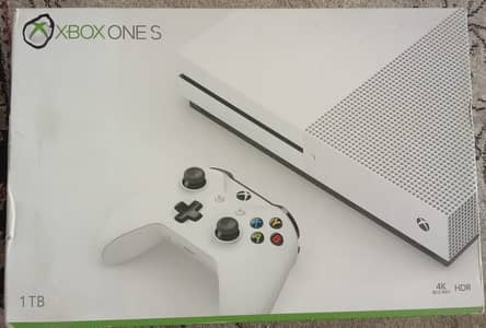 Xbox one s in very good condition and hardly used