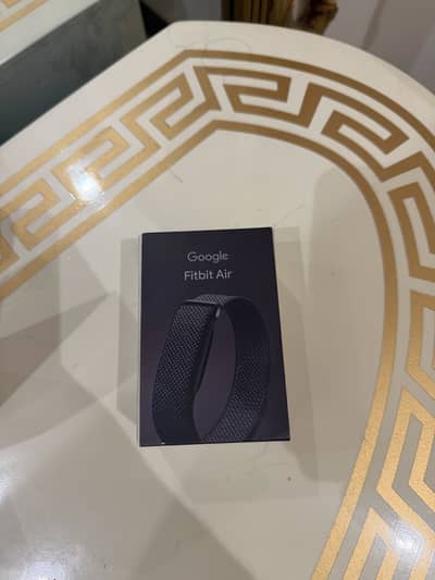 Google Fitbit air slightly used