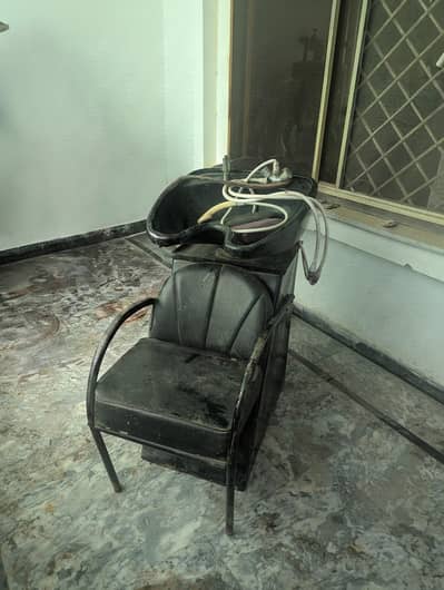 saloon chairs , bed and hair wash unit