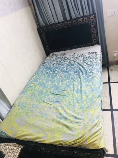 Wooden single bed in good condition