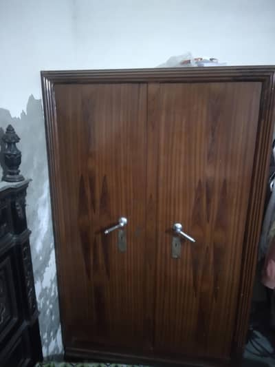 Spacious iron Wardrobe with Shelves & Drawer – Good Condition