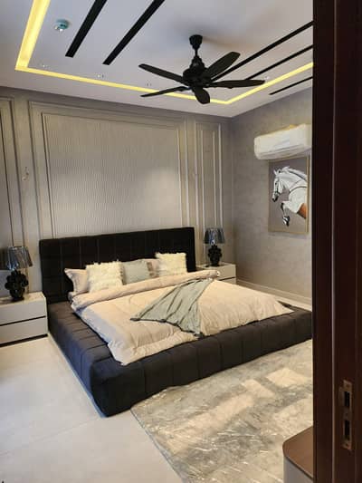 SYED BROTHERS PROUDLY OFFERS: 1-Kanal Elegant & Fully Furnished Modern Bungalow Is Available In The Best Block Of DHA Lahore.