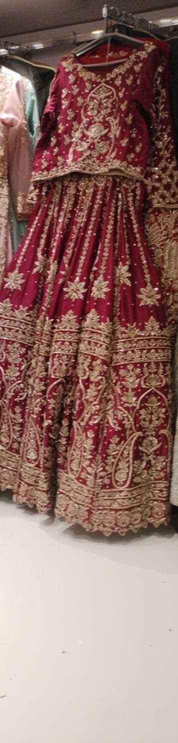 bridal lehnga with hand embellished work with potli