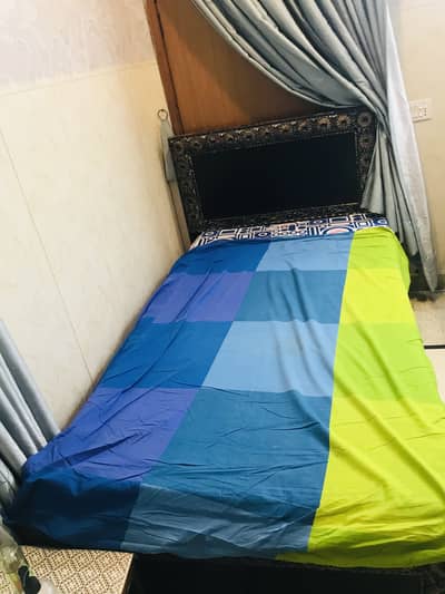 Wooden single bed in good condition