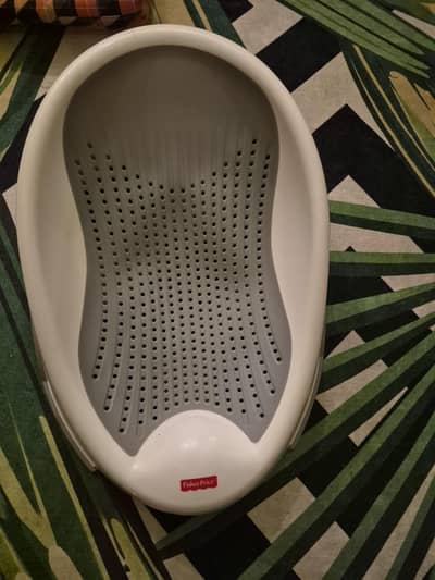 Bathing Tub and small toy along