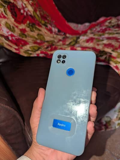 Xiaomi Redmi 9C with cable