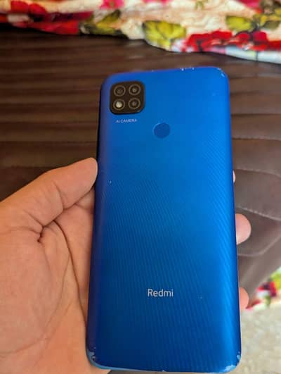 Xiaomi Redmi 9C with cable