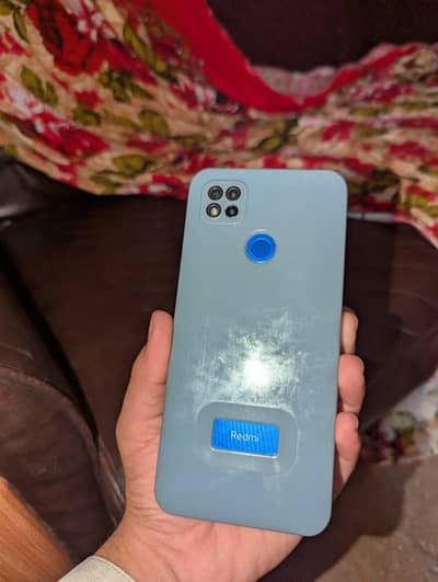 Xiaomi Redmi 9C with cable