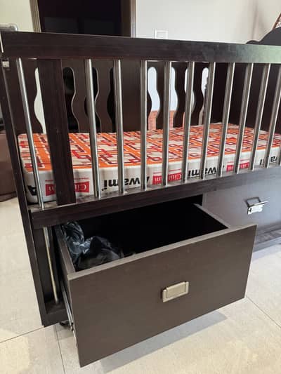 Baby cot used for a year. Perfect condition. Mattress is free with it