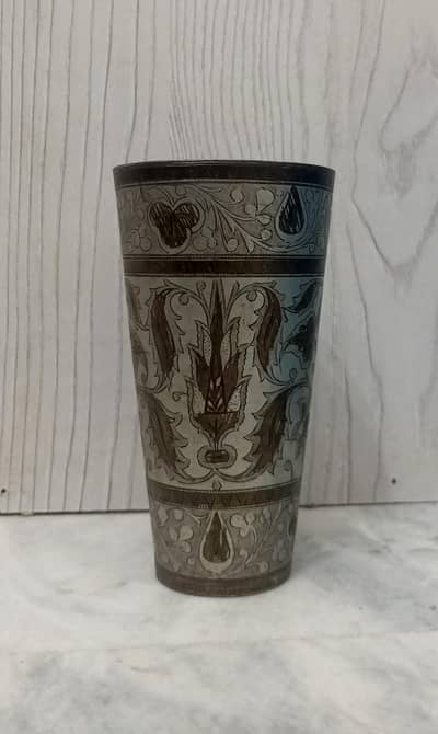 Antique metal glass