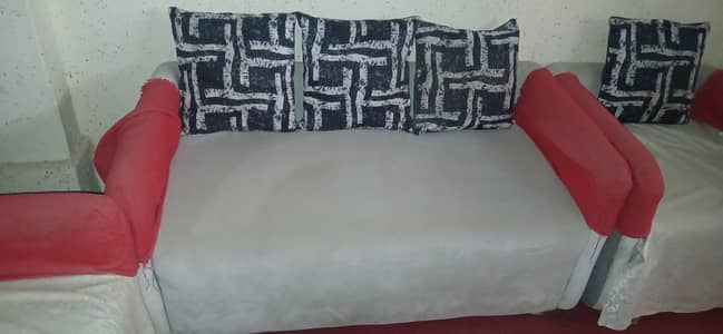 white sofa set with cushion