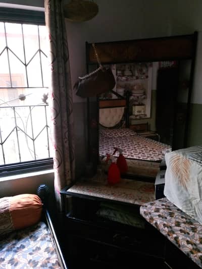 iron bed and dressing table and two side table