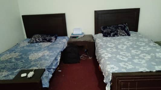 2 Single beds with mattress and middle table