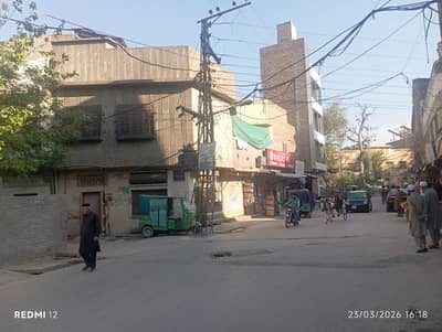 Peshawer, quaide abad, 5 marla commercial shops and house corner hot location near to Salman bakery