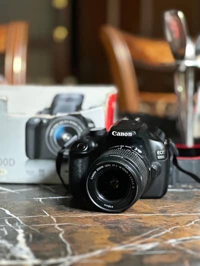canon 1200d with box