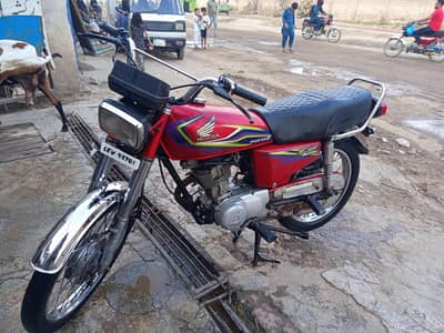 Honda 125 red colour genuine condition