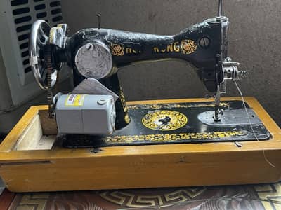 Sewing machine with motor
