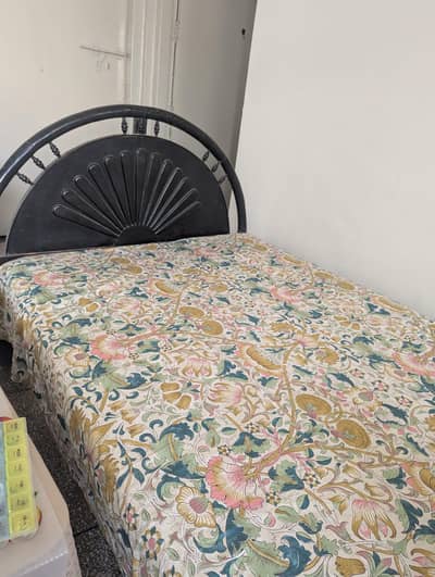 single bed wooden with mattress