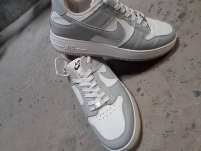 white and grey Nike(air) shoes 
