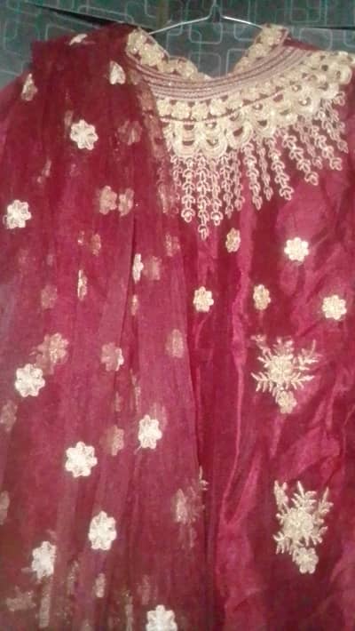 2pc maroon color maxi with stone work and tilla all over maxi.