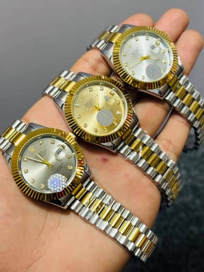 Rolex watch with date  gold colour gold addition water resistant